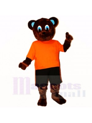 Ours brun de sport avec une chemise orange mascotte costumes de bande dessinée